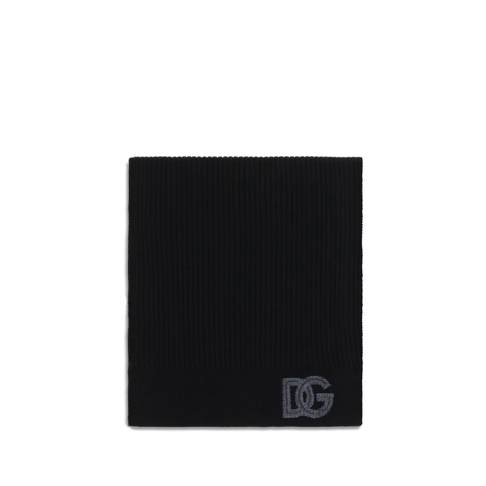 Elevate your style with the Dolce & Gabbana Black Wool Oves Aries Scarf, a luxurious accessory crafted from fine fleece wool, embodying timeless elegance and sophistication.