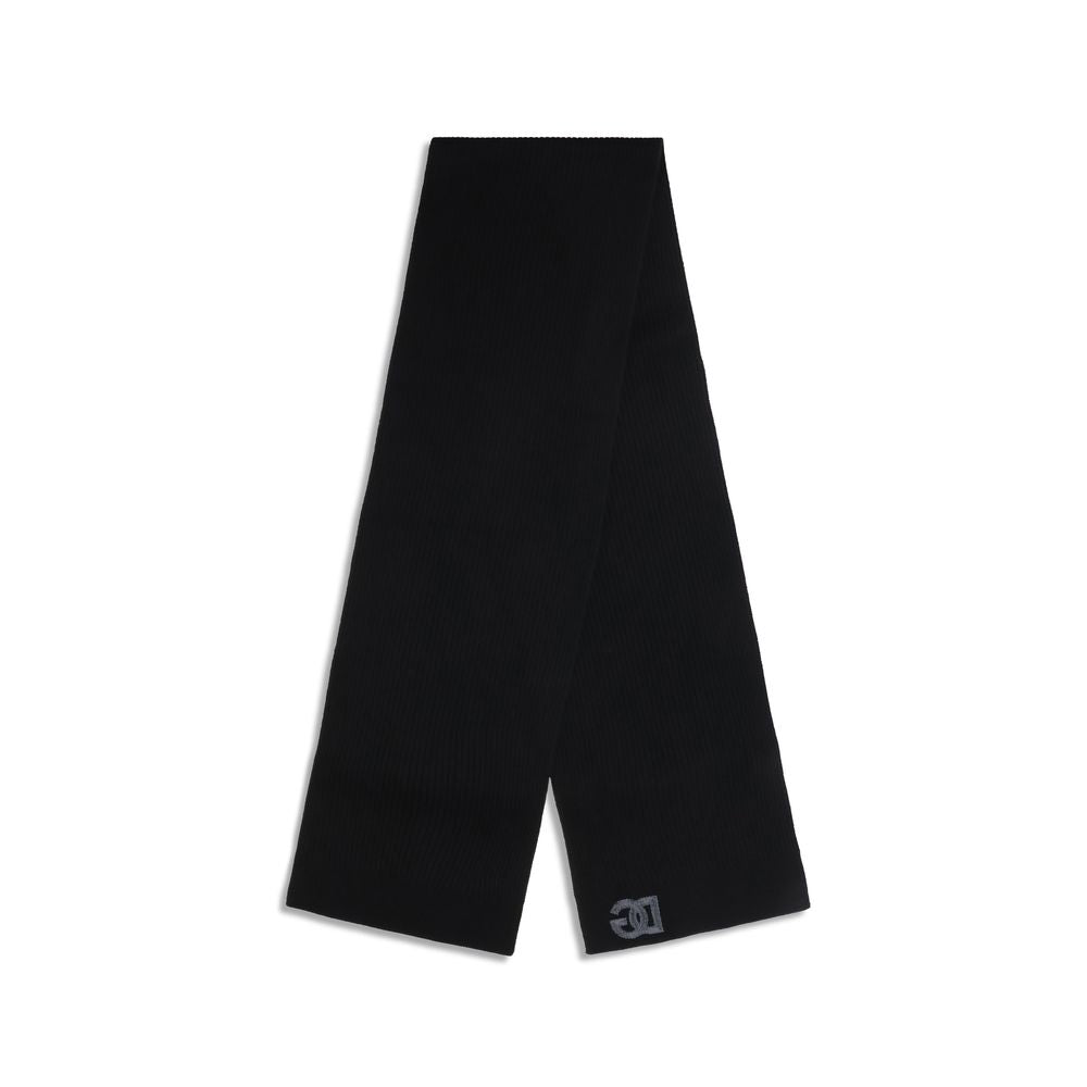 Elevate your style with the Dolce & Gabbana Black Wool Oves Aries Scarf, a luxurious accessory crafted from fine fleece wool, embodying timeless elegance and sophistication.