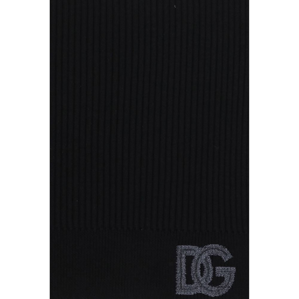 Elevate your style with the Dolce & Gabbana Black Wool Oves Aries Scarf, a timeless accessory crafted from sumptuous fleece wool, embodying luxury and sophistication.