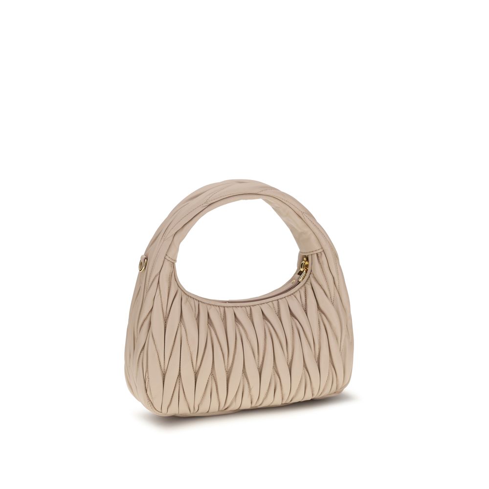 Miu Miu Beige Calf Leather Bos Taurus Handbag - Luxury Redefined
