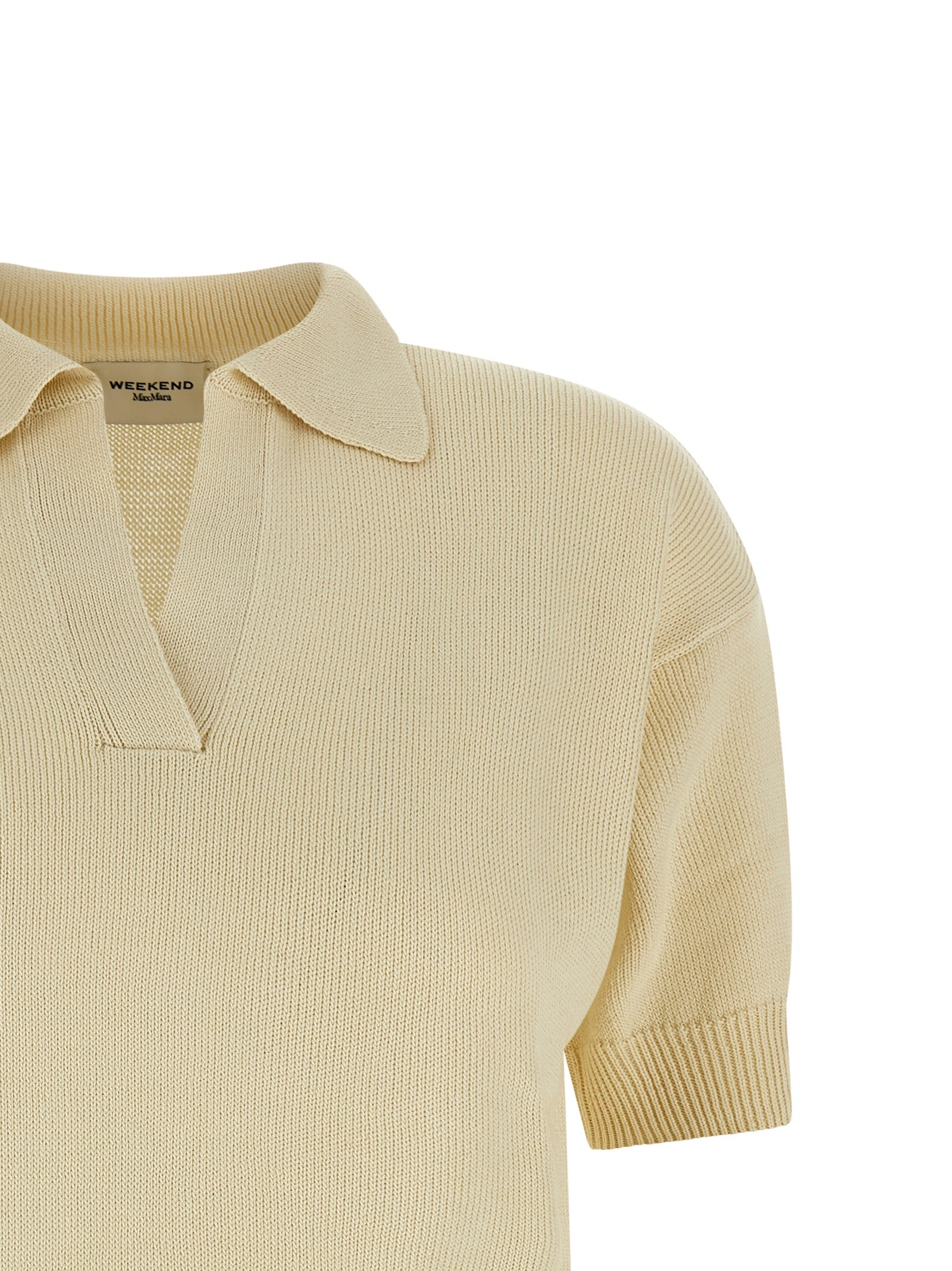 Discover the Weekend Max Mara Beige Cotton Cardigan, a masterpiece of elegance and comfort, crafted from pure cotton for effortless sophistication in any wardrobe.