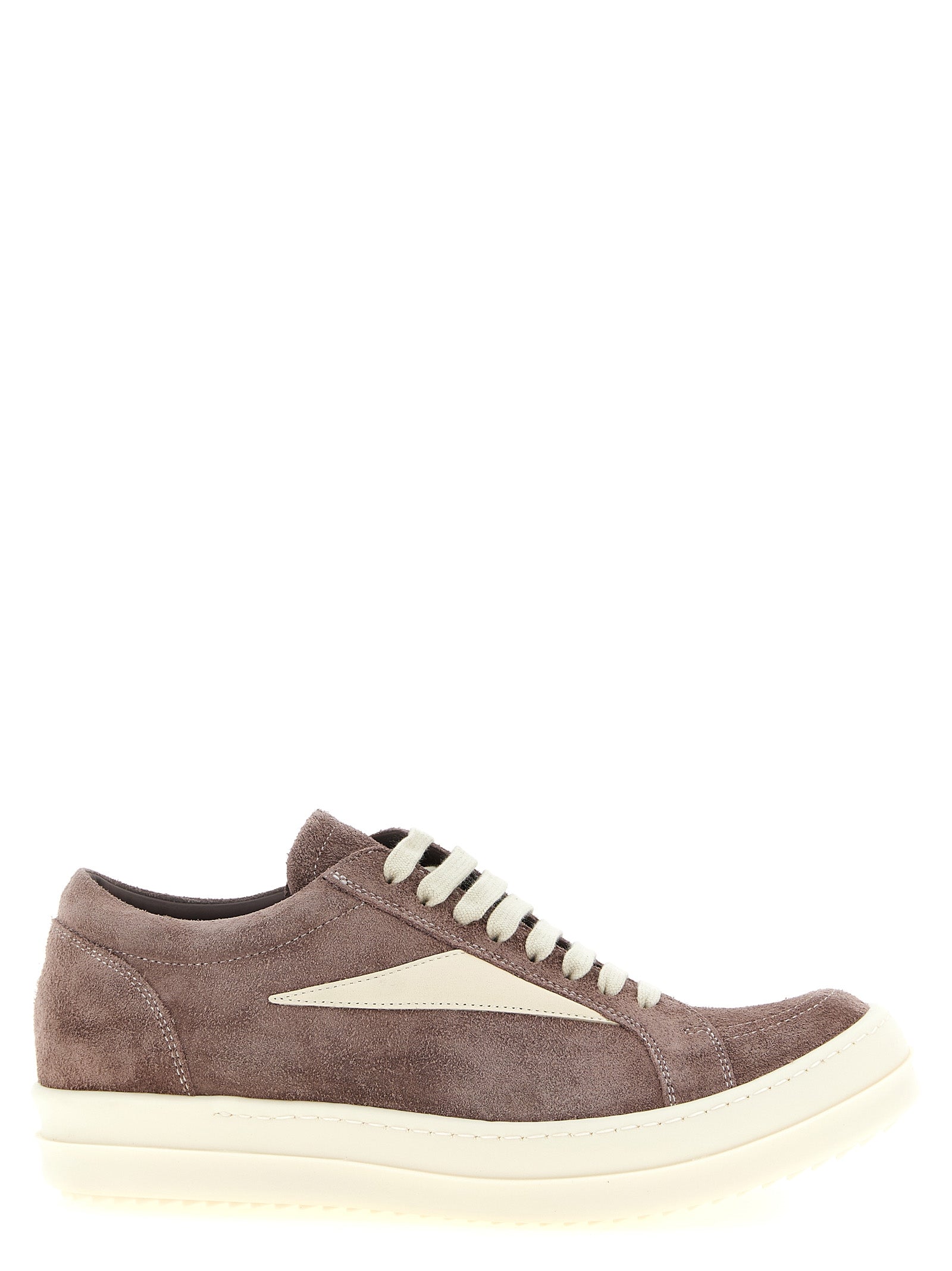 Elevate your style with Rick Owens' Purple Calfskin Low Top Sneakers, a blend of luxurious craftsmanship and bold design, perfect for the discerning fashion connoisseur.