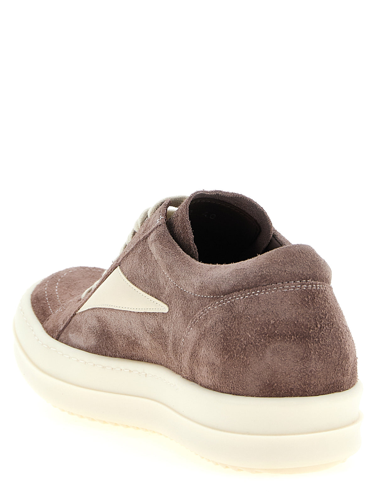 Elevate your style with Rick Owens Purple Calfskin Low Top Sneakers, a fusion of bold design and luxurious craftsmanship, perfect for the discerning fashion connoisseur.