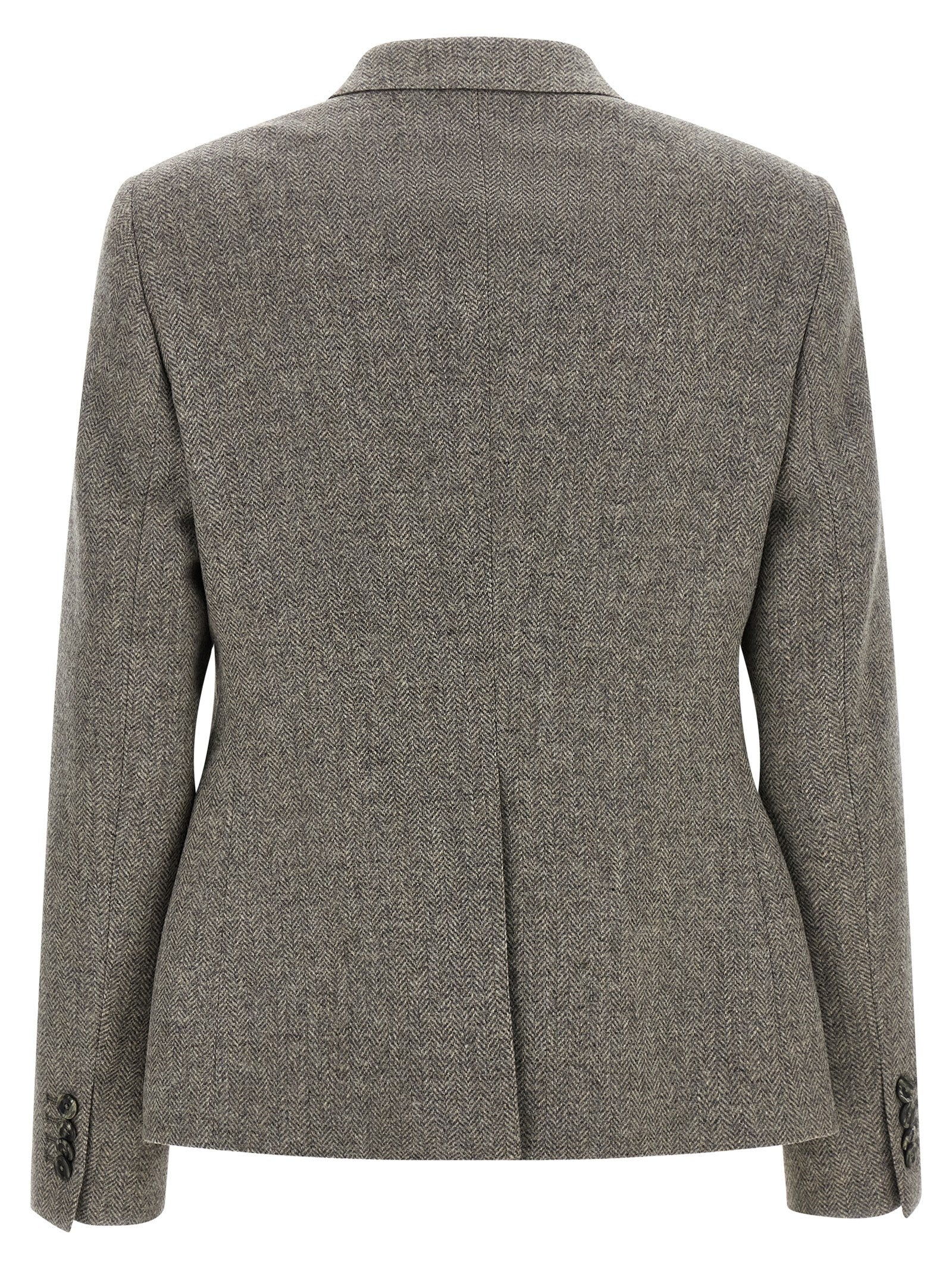 Elevate your wardrobe with the Tagliatore Gray Virgin Wool Blazer, a luxurious blend of 97% virgin wool and 3% cashmere, embodying timeless sophistication and Italian craftsmanship.