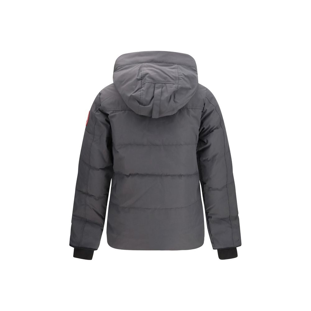 Indulge in the Canada Goose Gray Cotton Parka, a masterpiece of luxury outerwear crafted for elegance and warmth, redefining your winter style with sophistication.