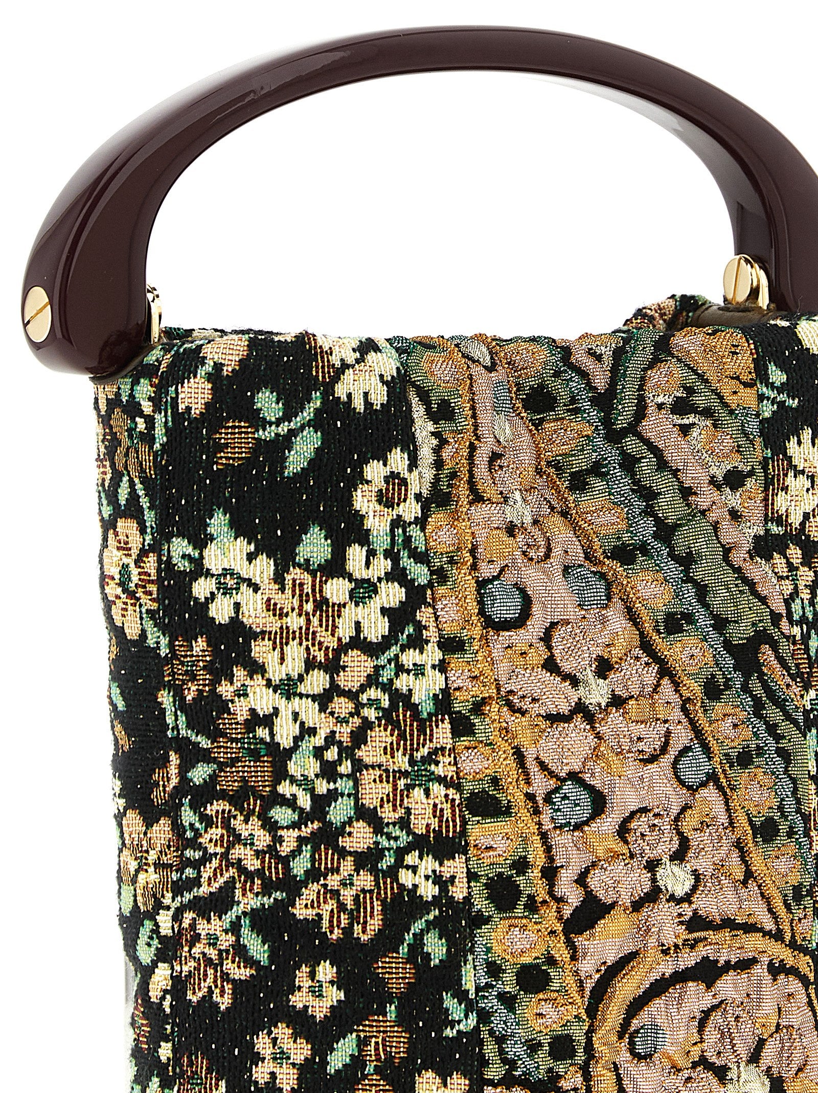 Elevate your style with the Dries Van Noten ‘Crispino’ handbag, a masterpiece of jacquard fabric and opulent design, perfect for those who embrace luxury and sophistication.