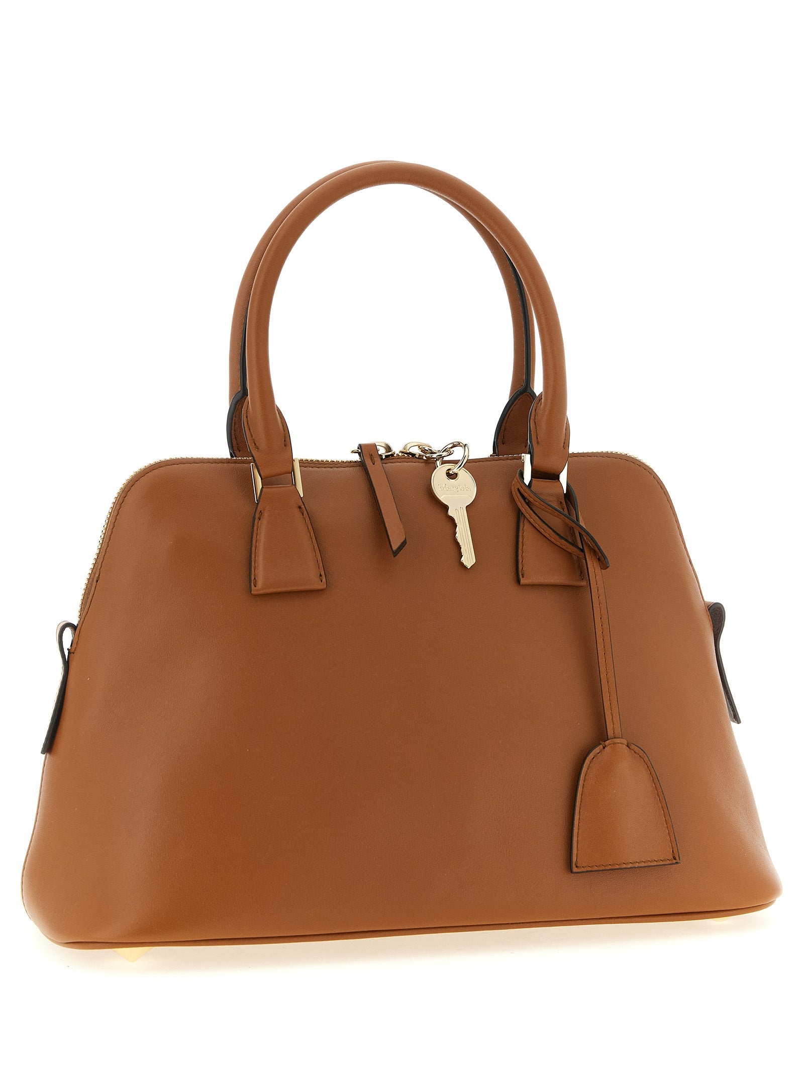 Indulge in the Maison Margiela ‘5AC Soft’ shoulder bag, a masterpiece of calfskin and suede that redefines luxury with its sophisticated design and exquisite craftsmanship.
