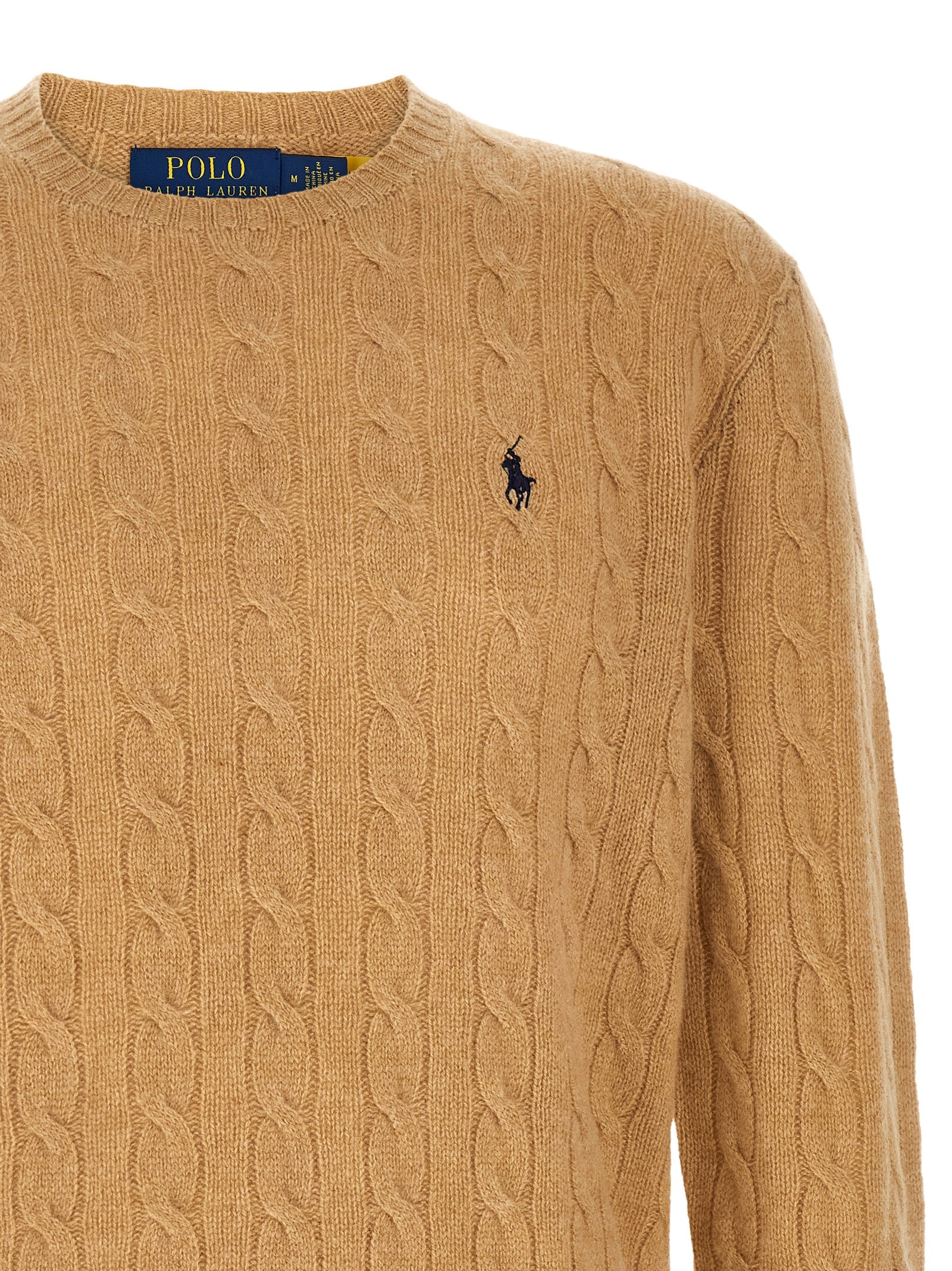 Indulge in the timeless elegance of the Polo Ralph Lauren Beige Wool Cardigan, a luxurious blend of wool and cashmere, perfect for the discerning wardrobe.