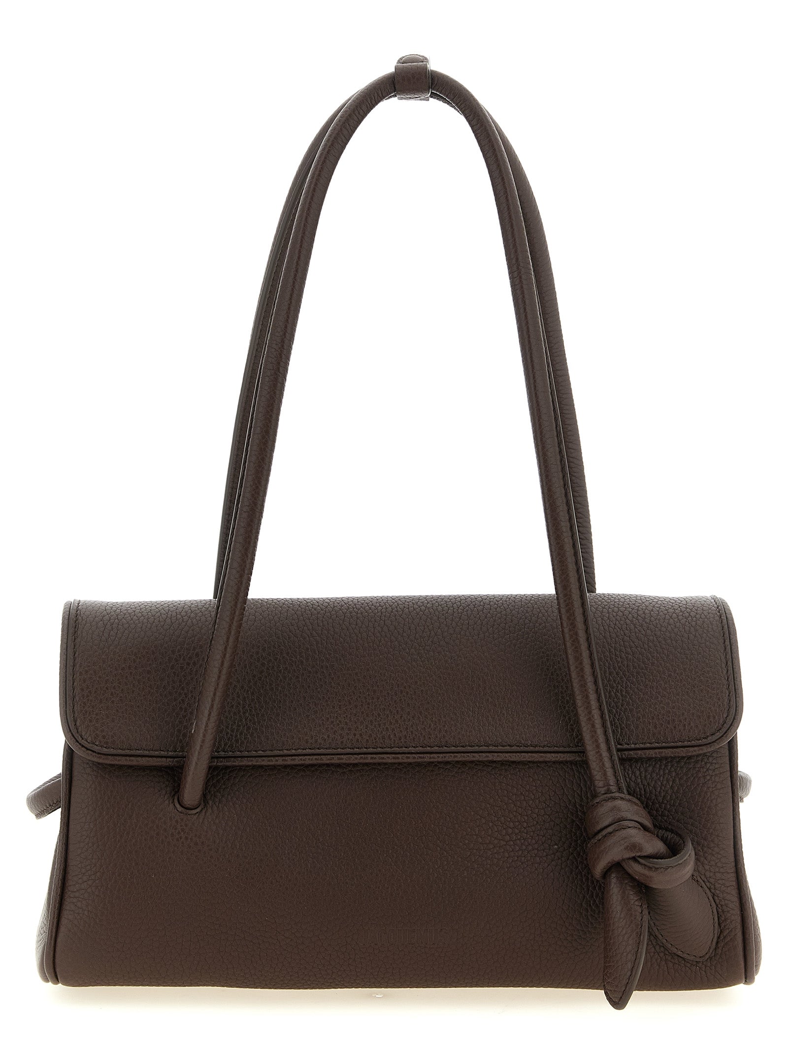 Indulge in the exquisite Jacquemus Brown Calfskin Shoulder Bag, a timeless Italian masterpiece crafted from luxurious hammered calf leather, embodying bold sophistication and refined elegance.