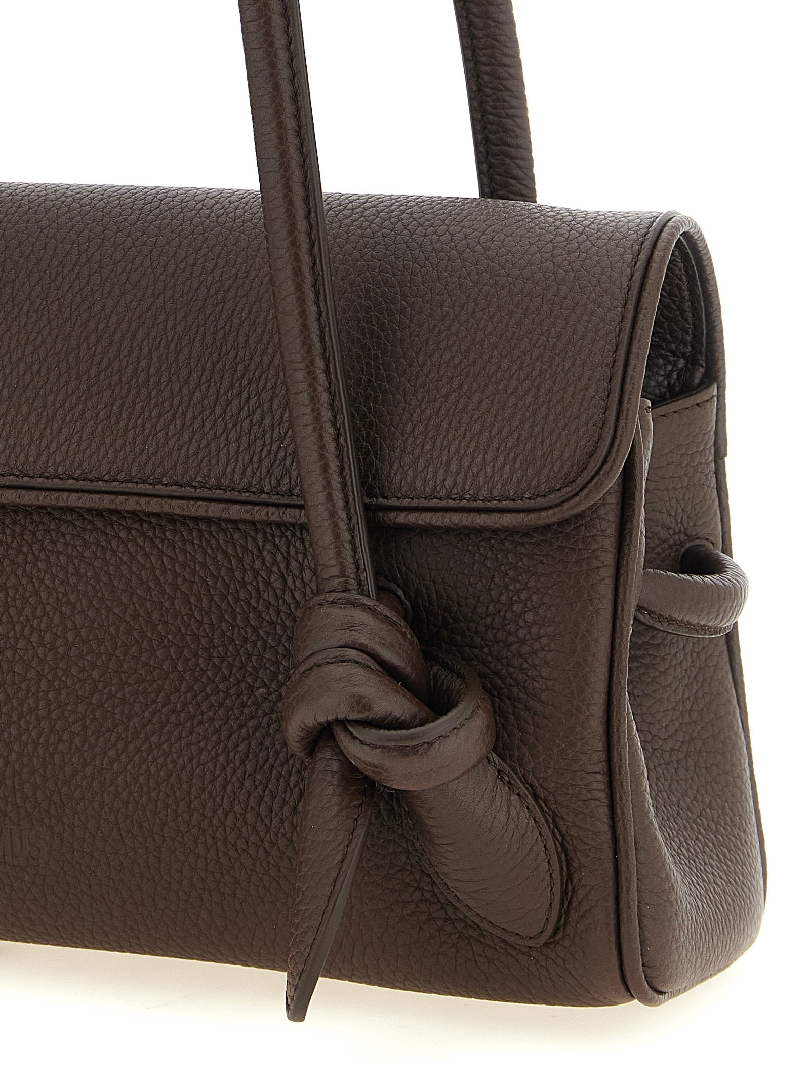 Elevate your style with the Jacquemus Brown Calfskin Shoulder Bag, a timeless Italian masterpiece crafted from exquisite hammered leather, embodying bold sophistication and refined elegance.