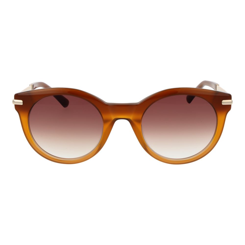 Indulge in the exquisite allure of Sandro's Orange Acetate Sunglasses, where sophisticated craftsmanship meets timeless elegance, perfect for the discerning style connoisseur.