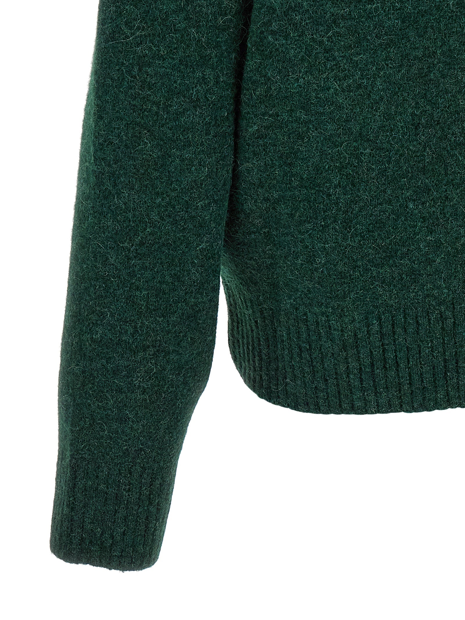 Elevate your wardrobe with the AMI Paris Bicolor Alpaca Leather Cardigan, a luxurious blend of alpaca and wool, embodying sophisticated style and timeless elegance.