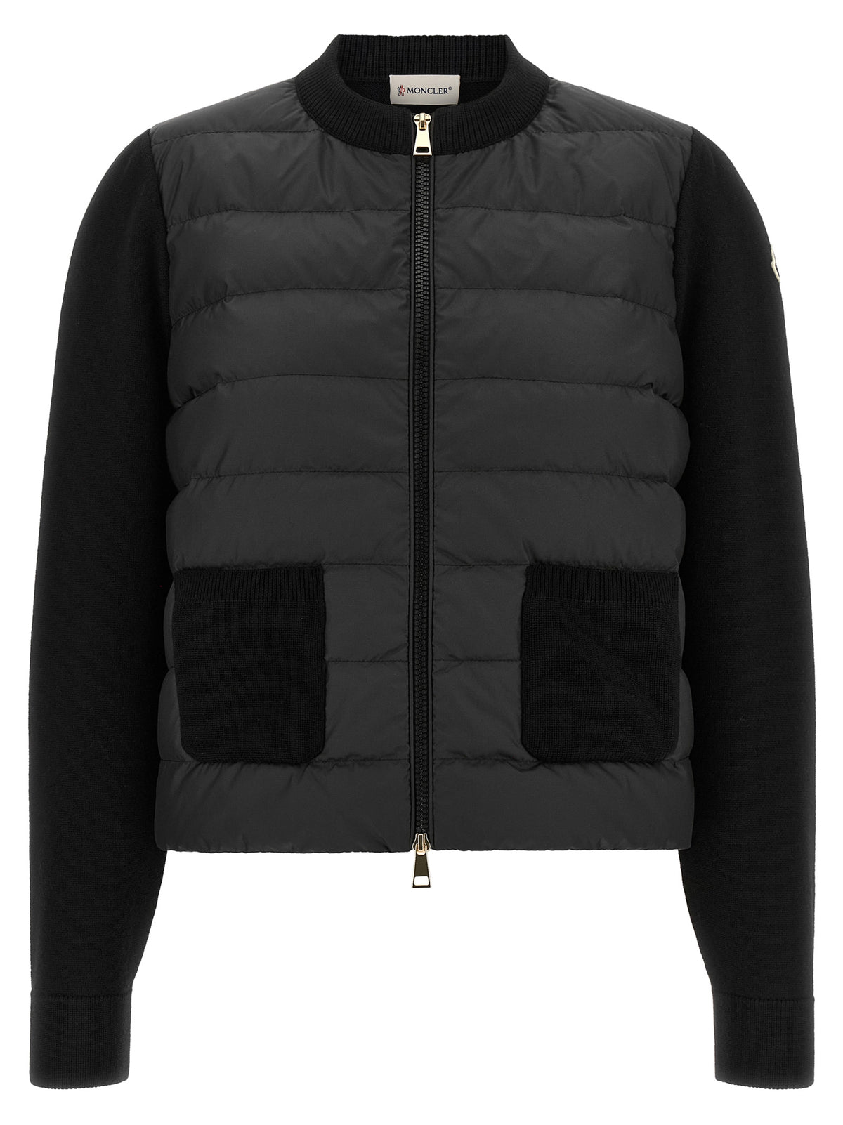 Experience the Moncler Black Polyester Cardigan, a luxurious hybrid design that blends exquisite craftsmanship with unparalleled style, perfect for the discerning individual.