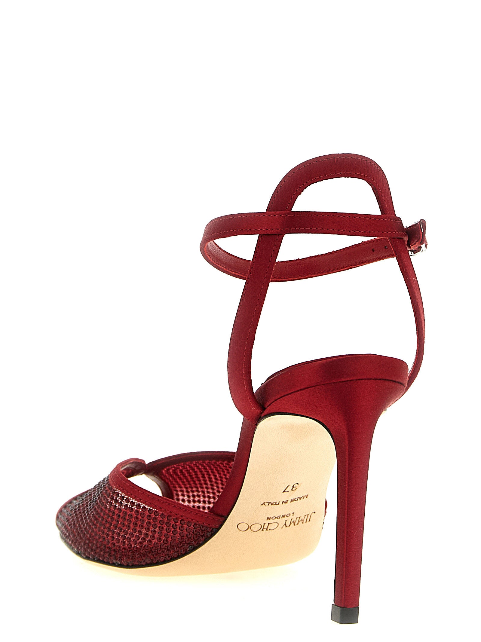 Indulge in the exquisite allure of Jimmy Choo's Sacora sandals, crafted from luxurious lamb leather and adorned with micro crystals, perfect for those who embody elegance and sophistication.