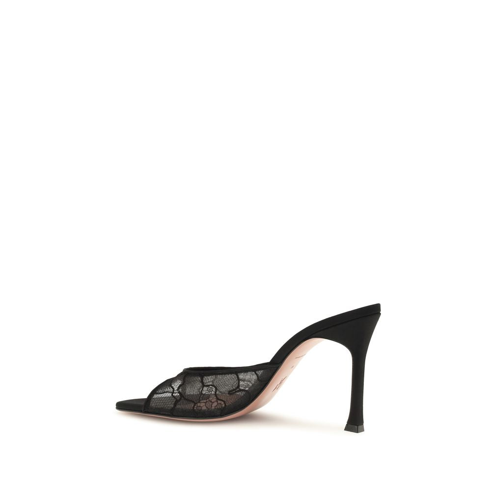 Step into the allure of Amina Muaddi Black Fabric Pumps, where exquisite Italian craftsmanship meets timeless elegance, perfect for the discerning individual seeking luxury.