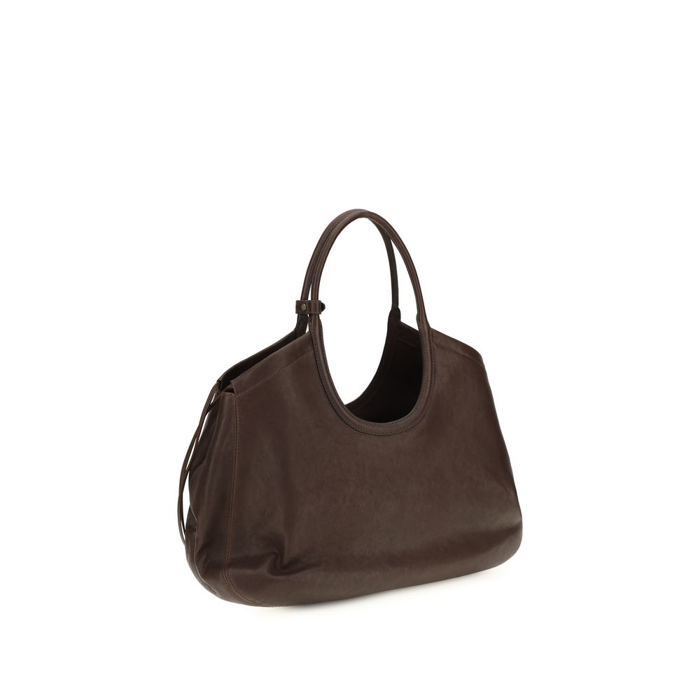 Discover the Miu Miu Brown Lamb Ovis Aries Handbag, a luxurious blend of aged nappa leather and exquisite craftsmanship, perfect for elevating your style.