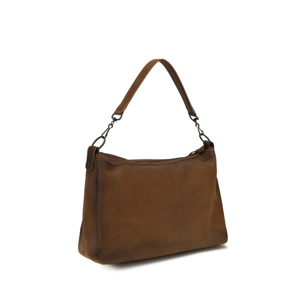 Indulge in the elegance of the Balenciaga Brown Lamb Ovis Aries Shoulder Bag, crafted from soft Arena lambskin, a timeless accessory for the discerning fashionista.