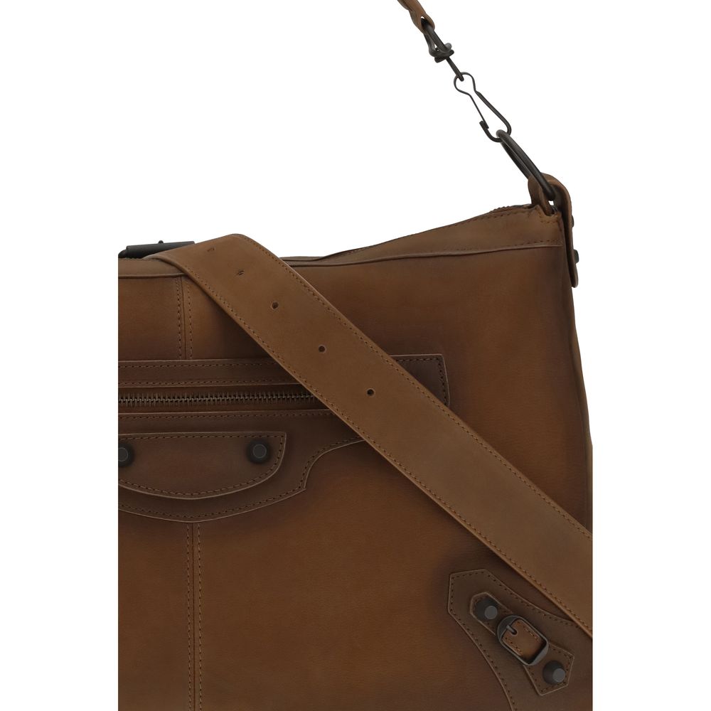 Indulge in the Balenciaga Brown Lamb Ovis Aries Shoulder Bag, crafted from soft Arena lambskin, a timeless accessory that embodies luxury and sophistication for any occasion.