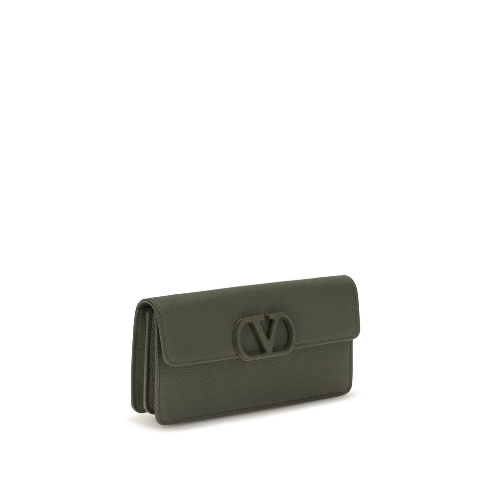 Elevate your accessory collection with the Valentino Garavani Bicolor Calf Leather Bos Taurus Wallet, a luxurious blend of exquisite craftsmanship and timeless elegance.