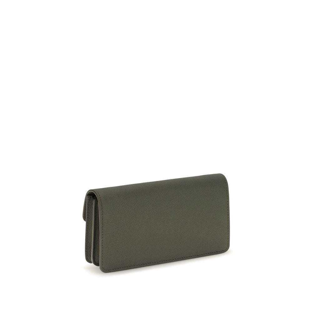 Indulge in the Valentino Garavani Bicolor Calf Leather Bos Taurus Wallet, a fusion of exquisite craftsmanship and timeless elegance, perfect for the discerning connoisseur.