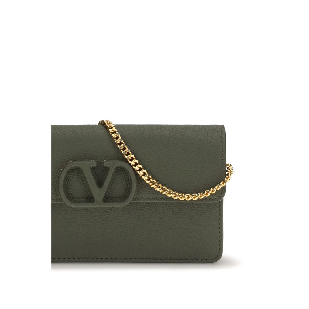 Discover the Valentino Garavani Bicolor Calf Leather Bos Taurus Wallet, a blend of exquisite craftsmanship and timeless elegance, perfect for elevating your style.