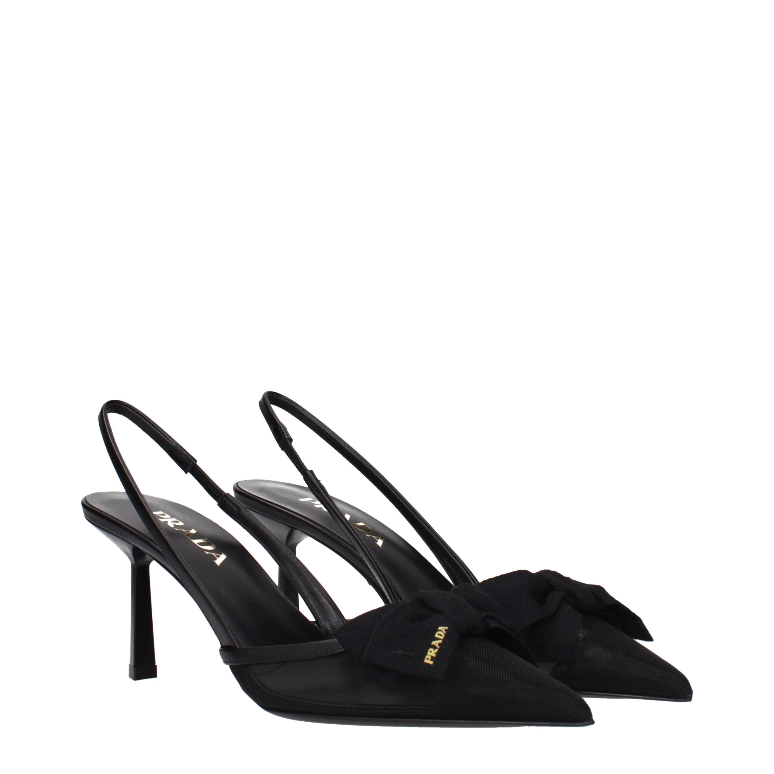 Experience the allure of Prada Black Fibres High Heel Pumps, where exquisite craftsmanship meets timeless elegance, perfect for any sophisticated occasion.