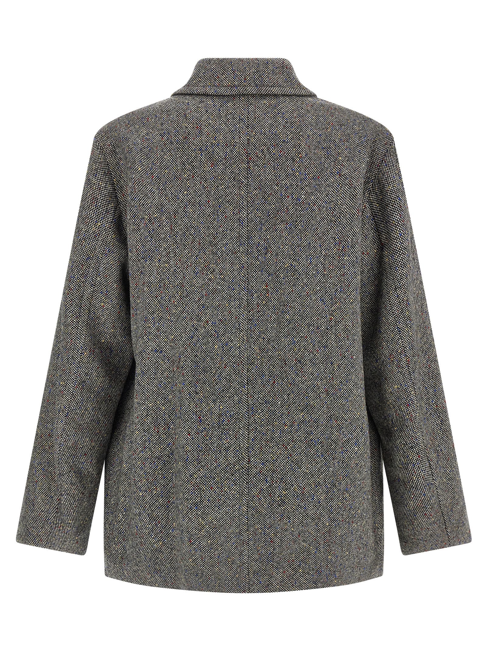Elevate your style with the Dries Van Noten Gray Wool Coat, a timeless masterpiece crafted from luxurious 100% wool, perfect for the discerning trendsetter.