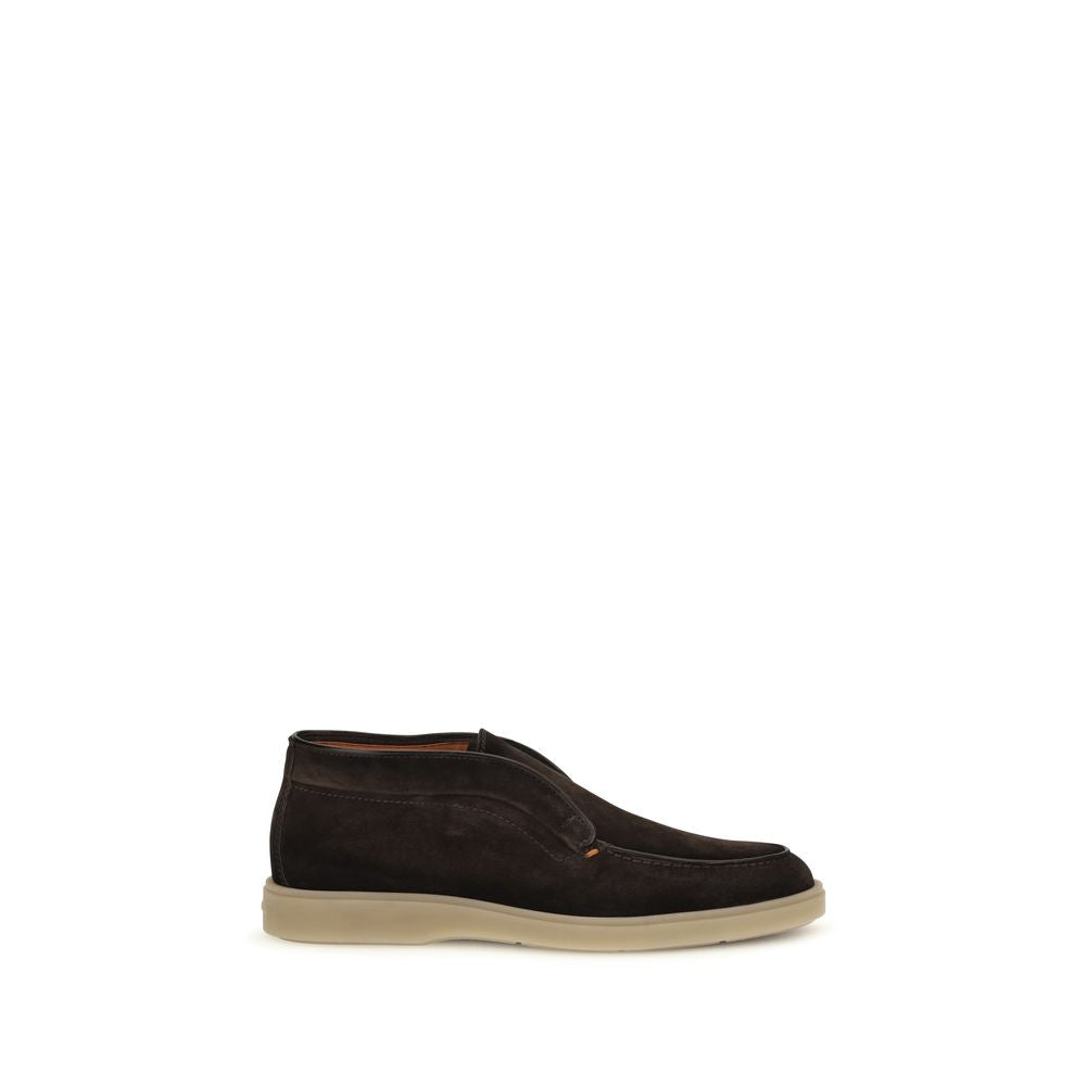 Indulge in the exquisite Santoni Brown Suede Leather Slip-On Loafers, crafted from soft suede for unparalleled comfort and timeless elegance, perfect for the discerning connoisseur.