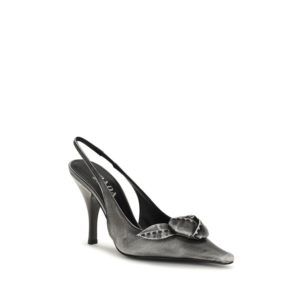 Step into a world of elegance with Prada Gray Goatskin High Heel Pumps, crafted from luxurious goatskin, blending vintage charm with modern sophistication for the discerning fashionista.