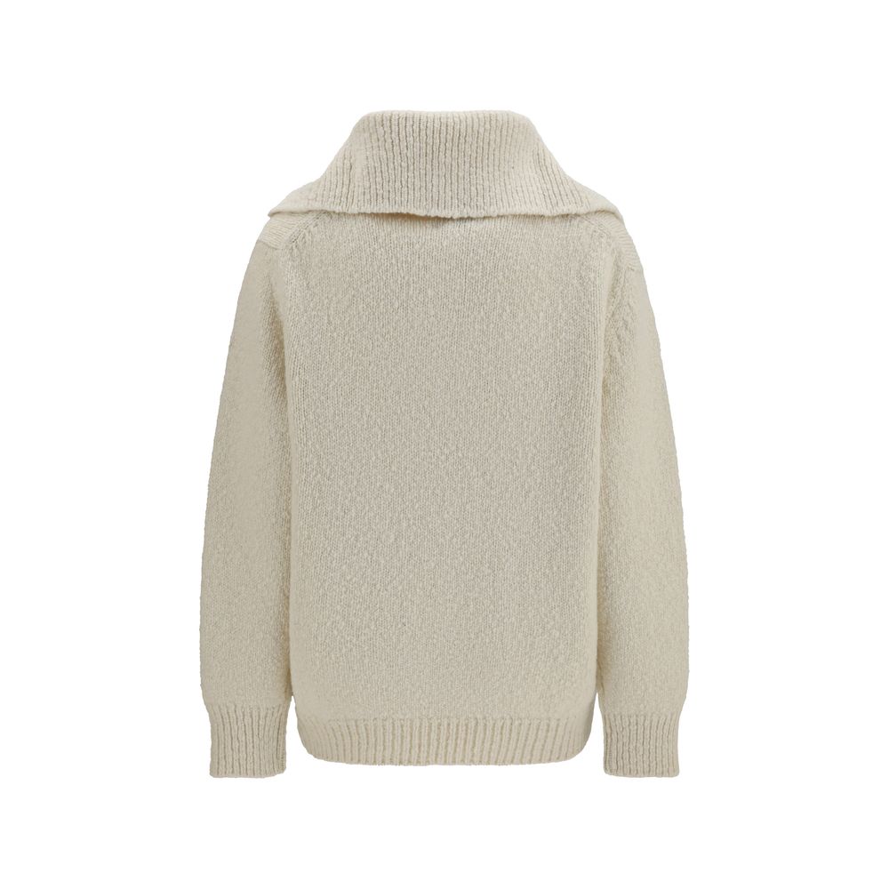 Elevate your wardrobe with the Malo Beige Cashmere Sweatshirt, a luxurious blend of cashmere and merino wool, embodying timeless elegance and sophisticated charm.