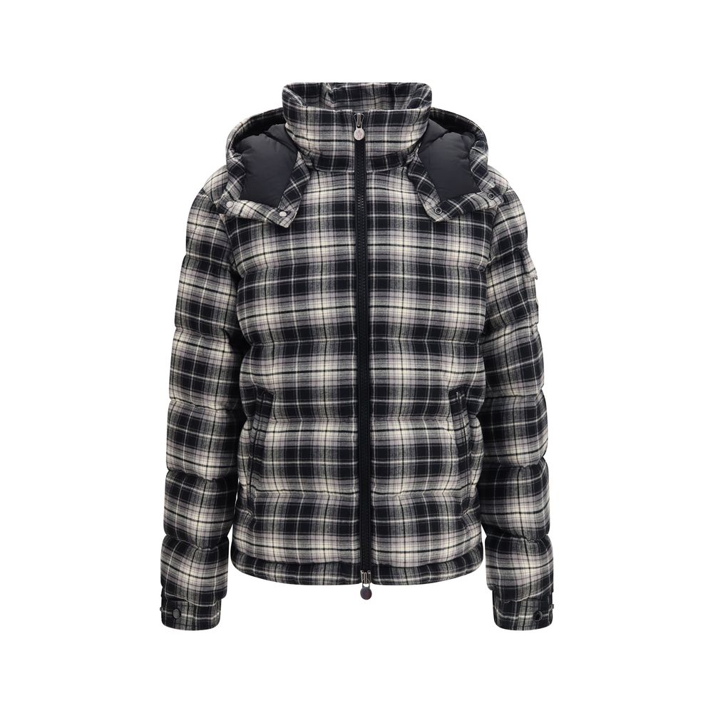 Indulge in the Moncler Black Cotton Full-Length Jacket, where exquisite craftsmanship meets luxurious comfort, perfect for the discerning individual seeking timeless elegance.