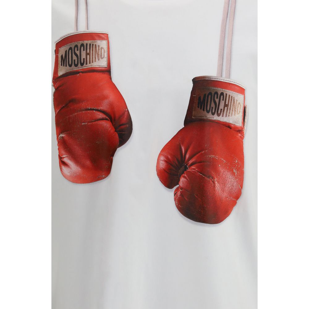 Elevate your wardrobe with the Moschino White Cotton Sportswear T-shirt, featuring a striking boxing gloves print, a perfect blend of artistry and comfort for the modern connoisseur.