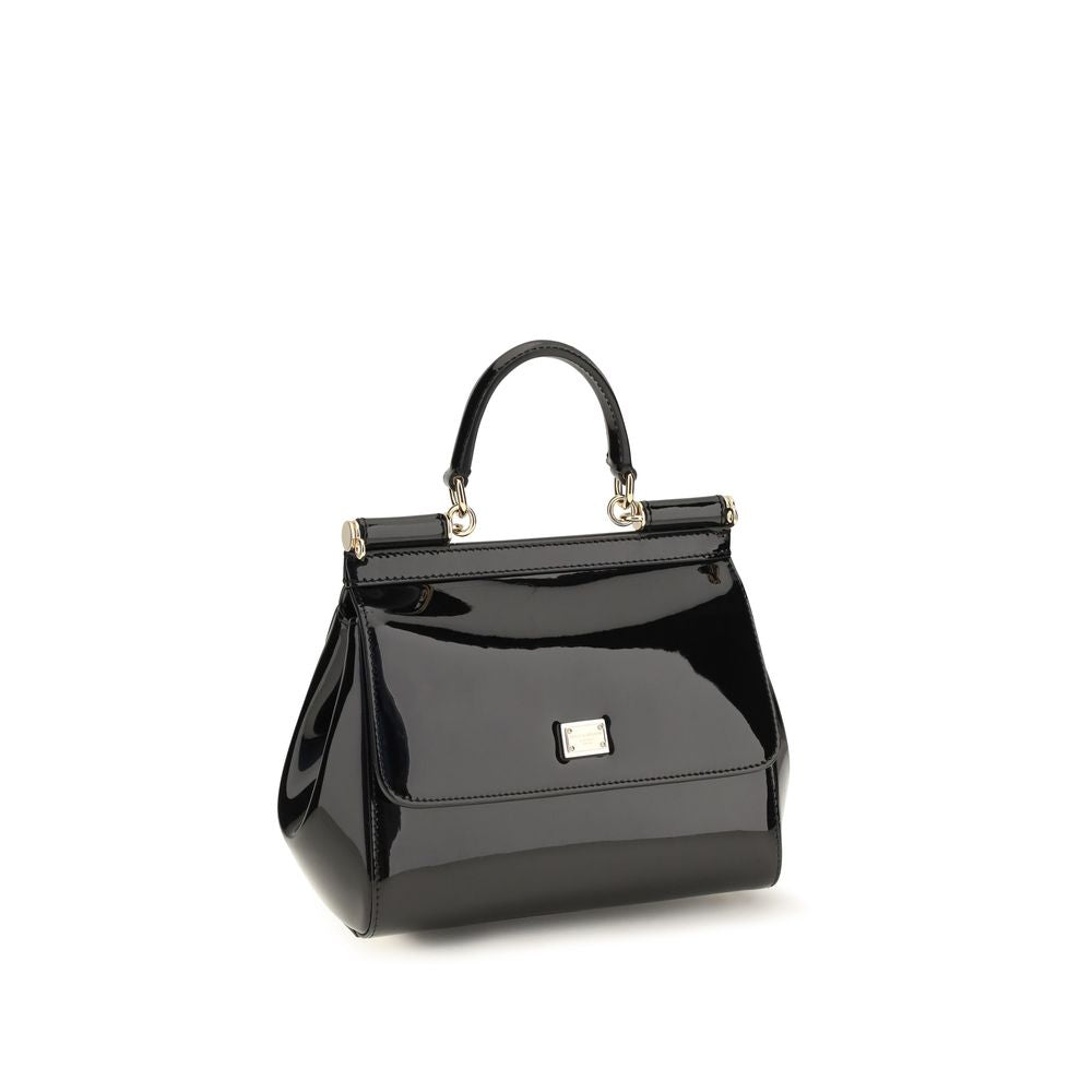 Indulge in the exquisite allure of the Dolce & Gabbana Black Calf Leather Bos Taurus Shoulder Bag, a masterpiece of Italian craftsmanship that elevates your style with its luxurious silhouette and refined details.