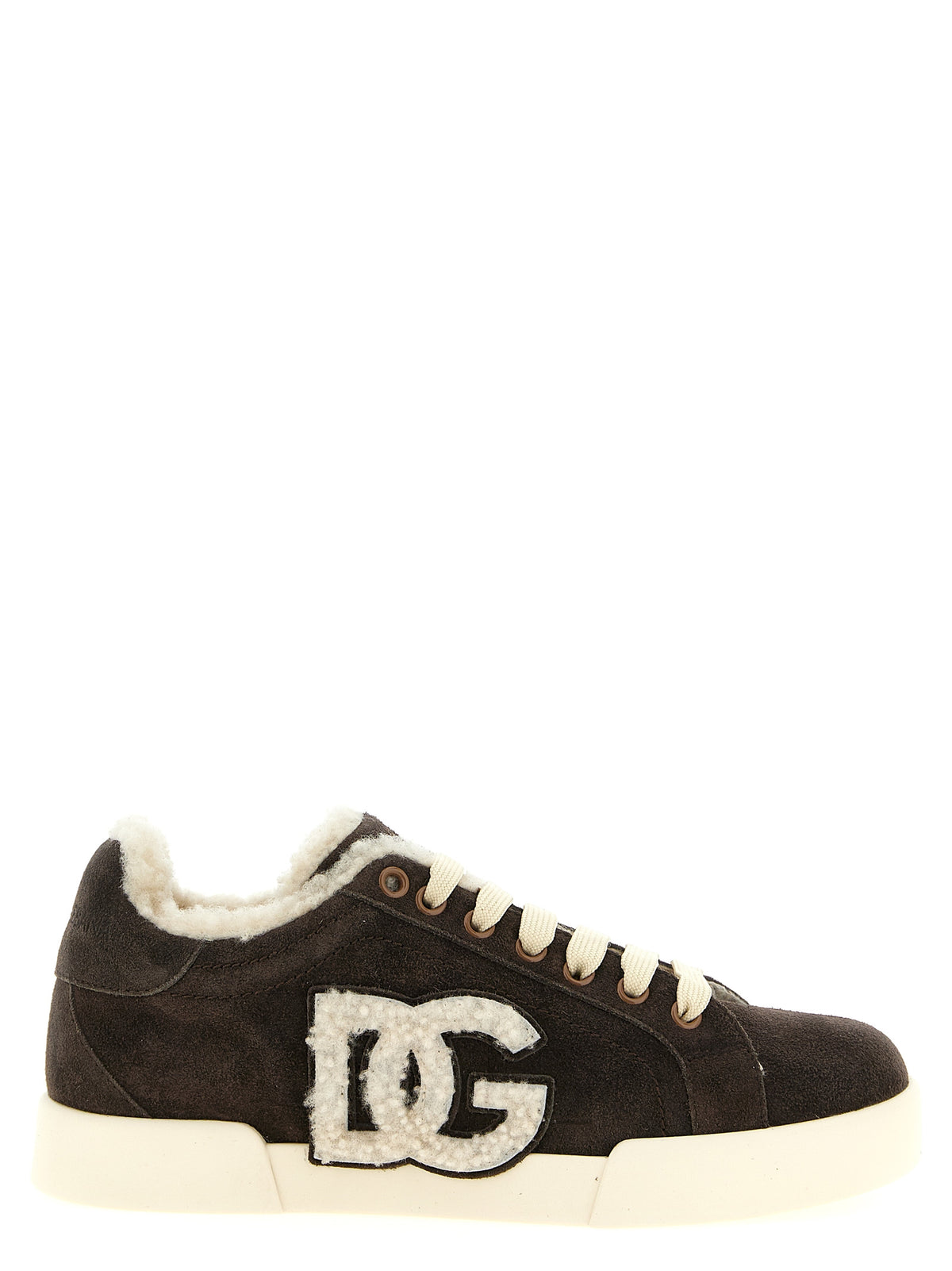 Indulge in the exquisite Dolce & Gabbana Brown Calfskin Low Top Sneakers, where sumptuous suede meets iconic design, embodying luxury and elegance for every occasion.