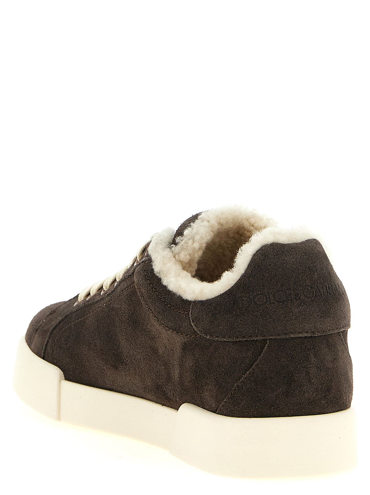 Experience the allure of Dolce & Gabbana's Brown Calfskin Low Top Sneakers, where exquisite craftsmanship meets luxurious comfort, perfect for the discerning individual.