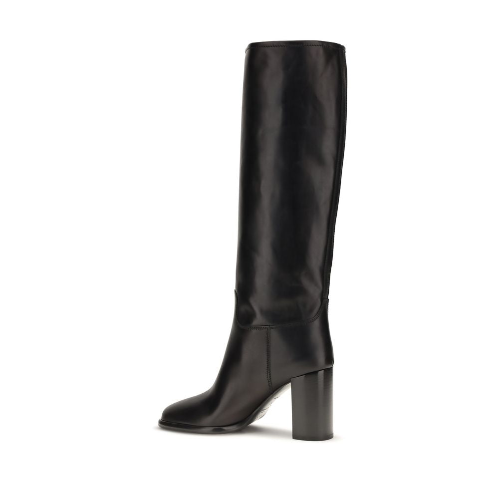 Experience the allure of Prada Black Calf Leather Bos Taurus High Heel Boots, where exquisite craftsmanship meets timeless elegance, elevating every moment in style.