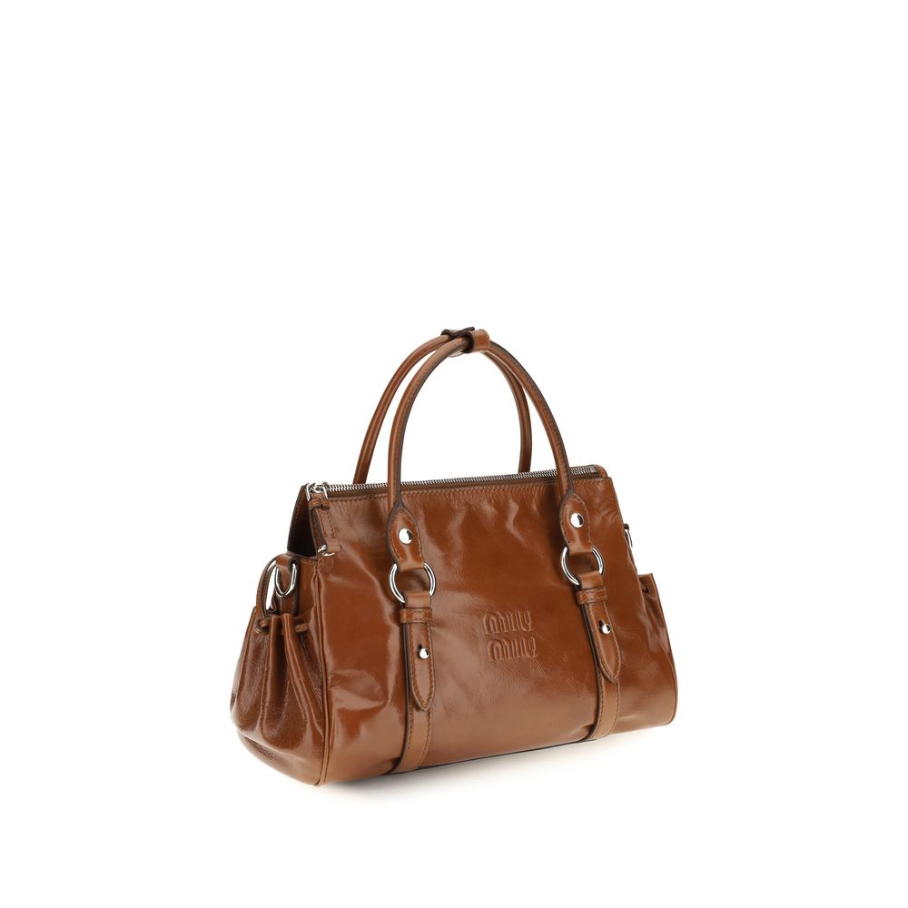 Miu Miu Brown Calf Leather Bos Taurus Handbag - Timeless Elegance