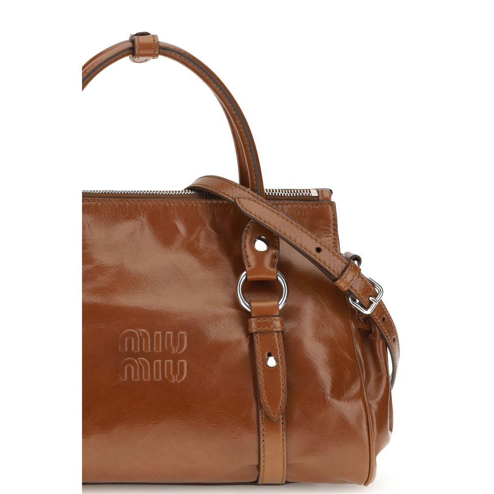 Miu Miu Brown Calf Leather Bos Taurus Handbag - Timeless Elegance
