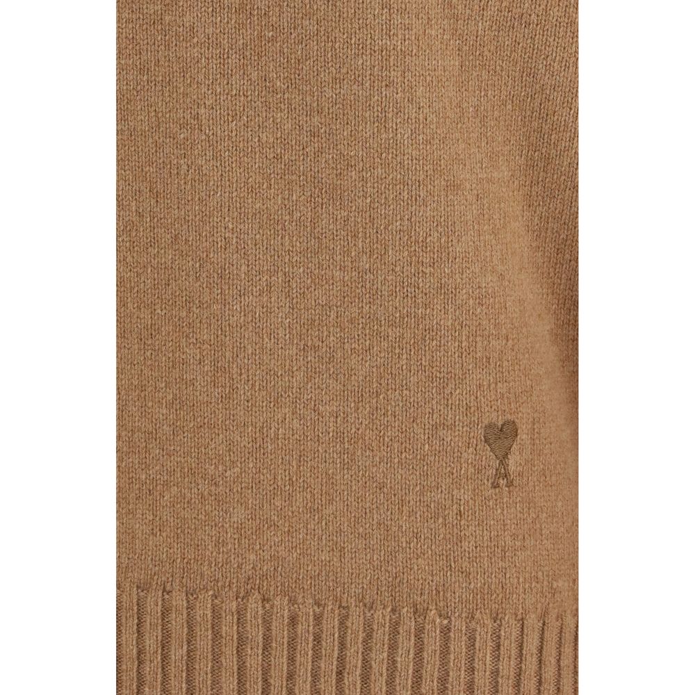 Indulge in the Ami Paris Brown Cashmere Sweatshirt, crafted from a sumptuous blend of cashmere and merino wool, embodying timeless elegance for the discerning individual.