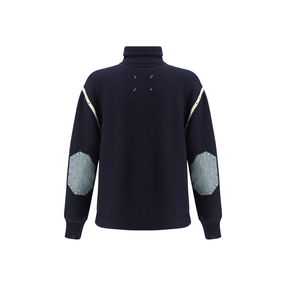 Indulge in the Maison Margiela Blue Wool Oves Aries Sweatshirt, a masterpiece of 100% Wool Ovis Aries, blending timeless elegance with modern sophistication for the discerning individual.