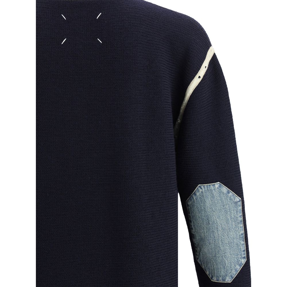 Indulge in the Maison Margiela Blue Wool Oves Aries Sweatshirt, a masterpiece of 100% Wool Ovis Aries, blending sophistication with unparalleled comfort for the discerning individual.