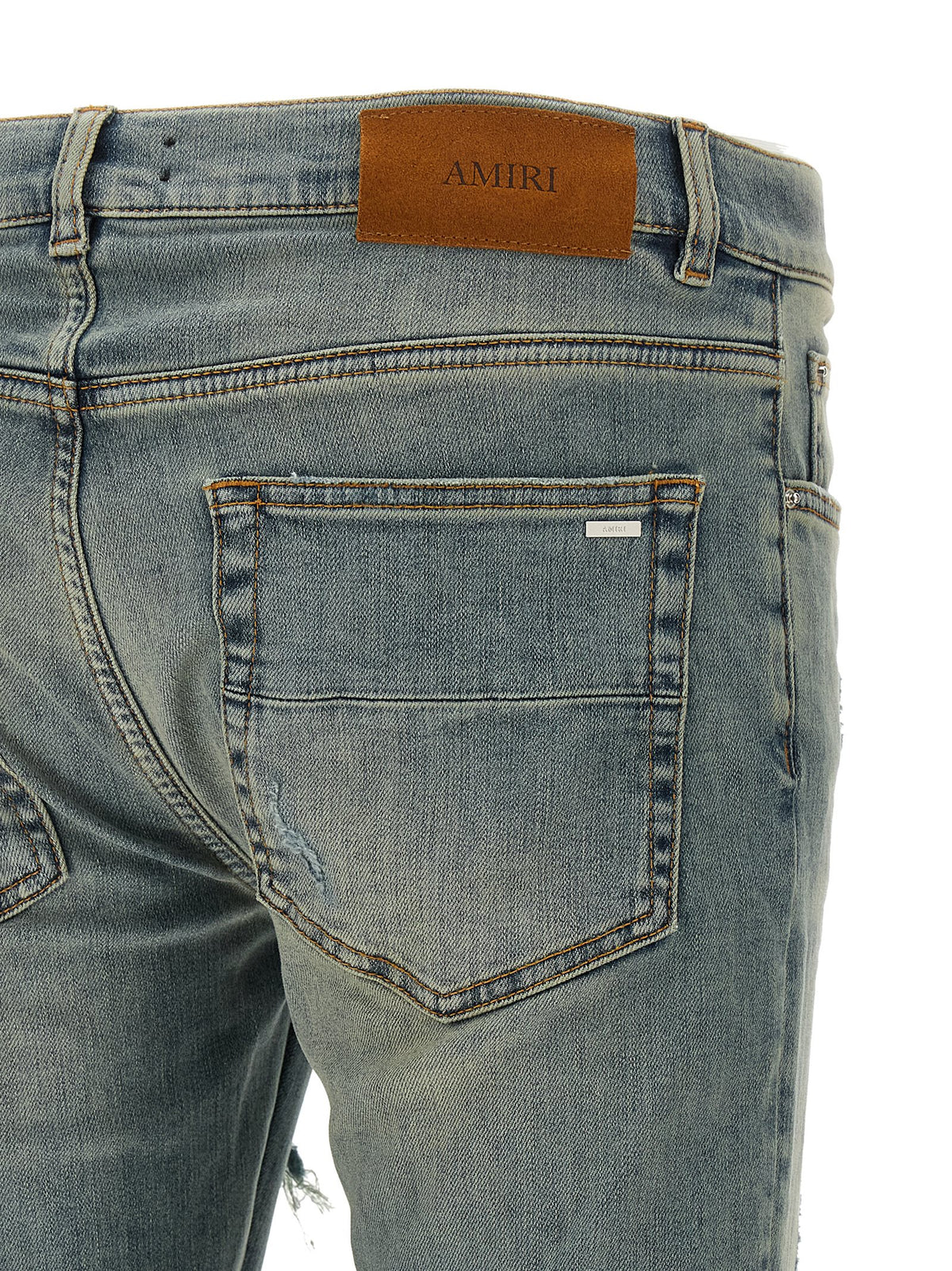 Experience the allure of Amiri Blue Cotton Skinny Jeans, where luxurious stretch denim meets bold design, embodying sophistication and urban elegance for the discerning individual.