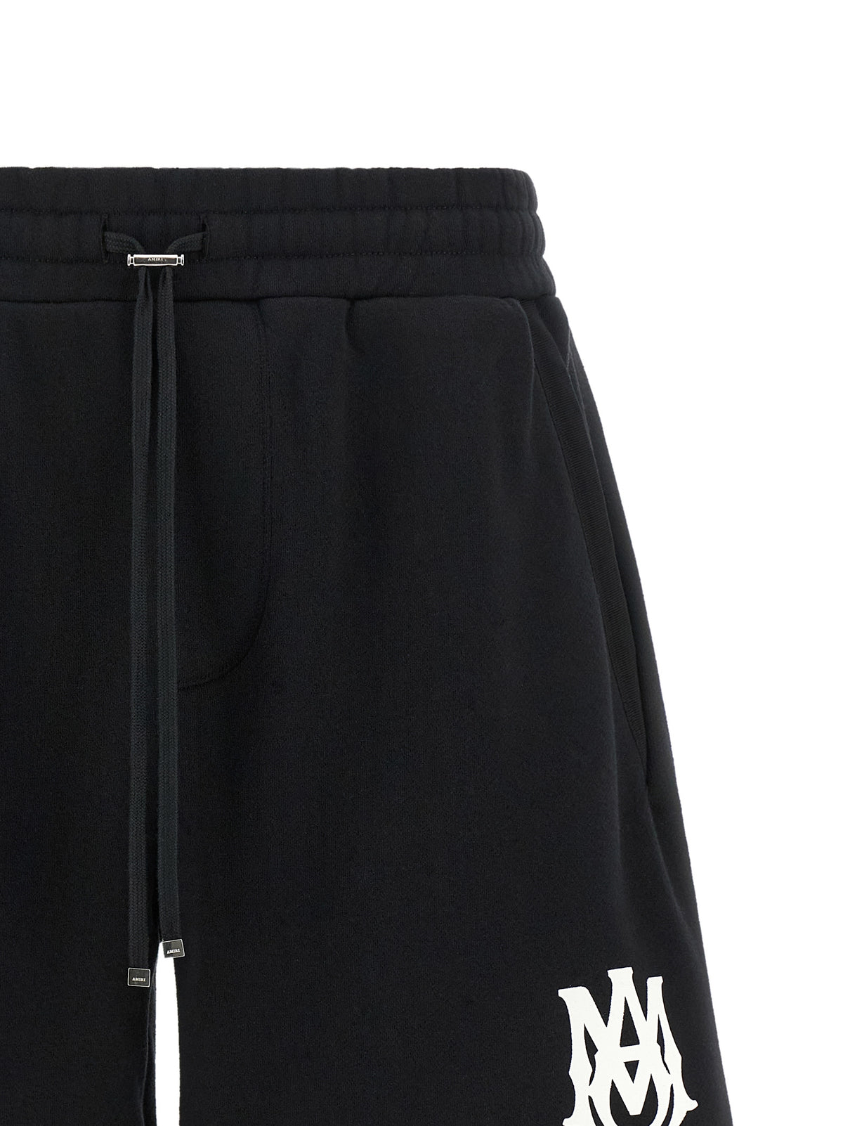 Indulge in the Amiri Black Cotton Bermuda Shorts, where Italian craftsmanship meets luxurious comfort, perfect for the modern connoisseur seeking effortless elegance.