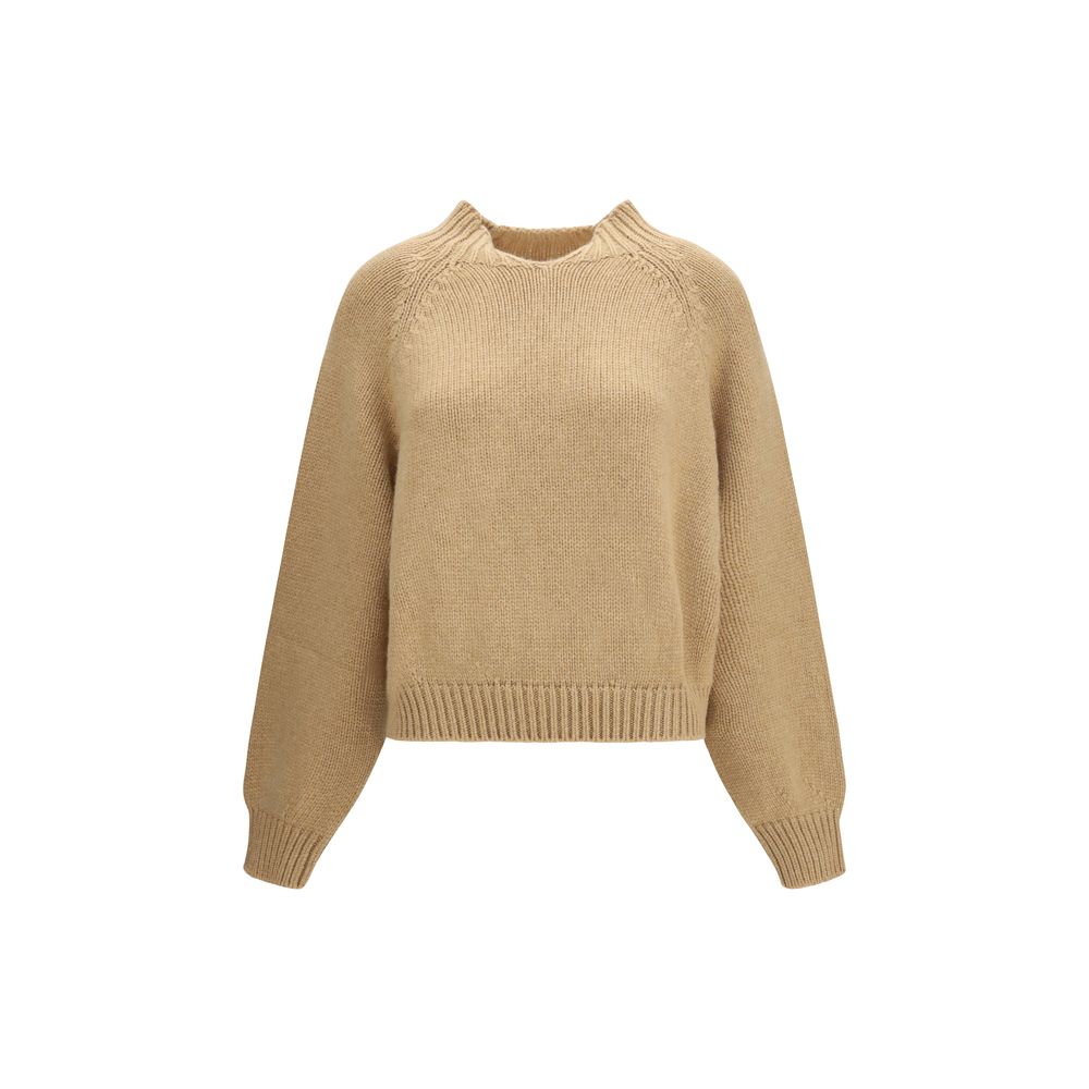 Indulge in the luxurious Khaite Beige Cashmere Sweater, crafted from exquisite Italian cashmere, embodying refined elegance and timeless sophistication for the discerning individual.