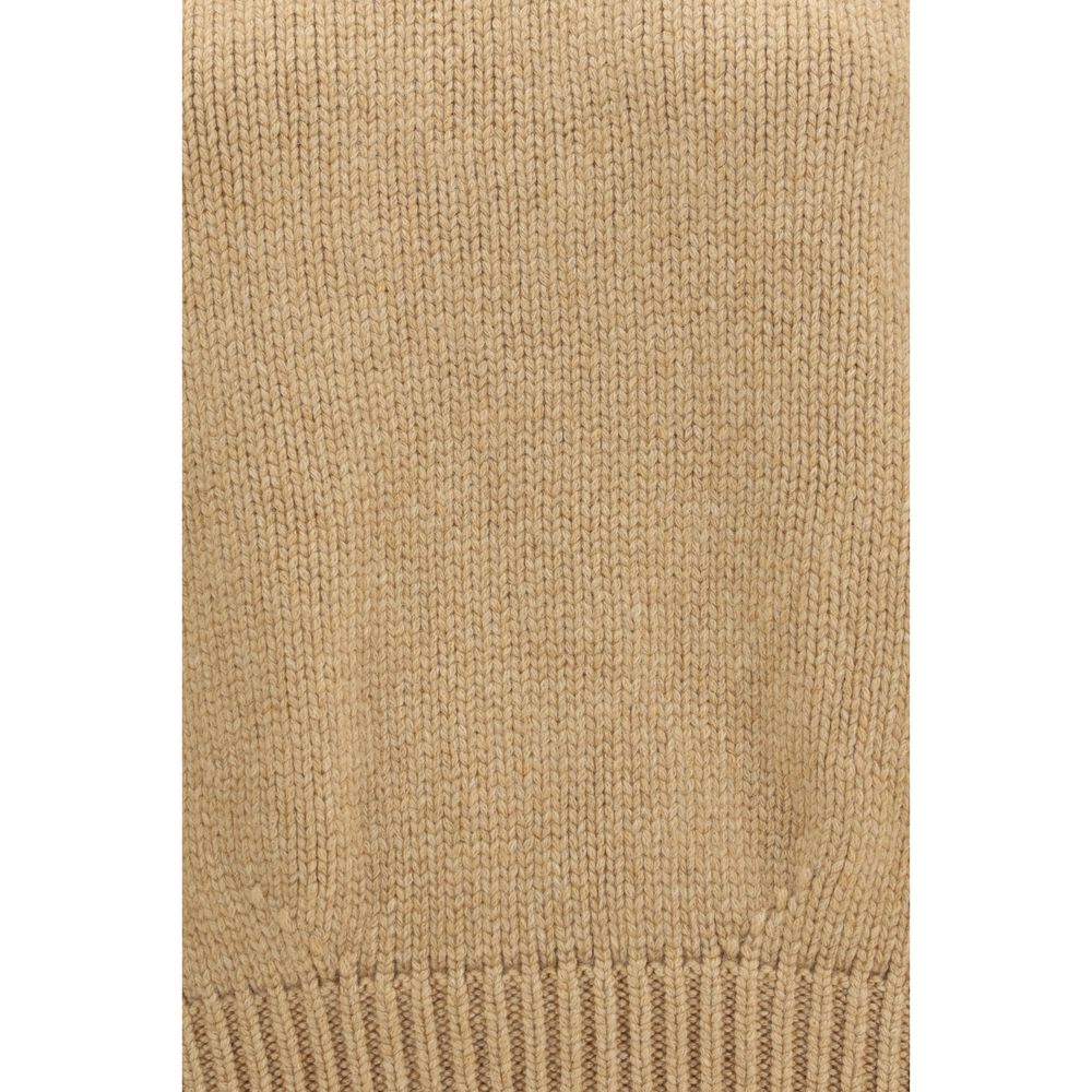 Indulge in the luxurious Khaite Beige Cashmere Sweater, crafted from exquisite Italian cashmere, embodying refined elegance and timeless sophistication for the discerning wardrobe.