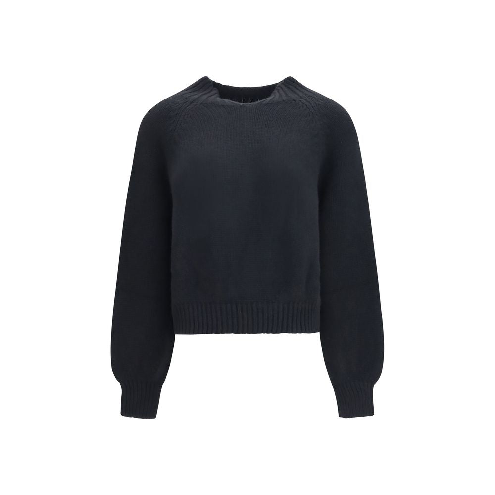 Indulge in the refined elegance of the Khaite Black Cashmere Sweatshirt, crafted from luxurious Italian cashmere, embodying sophistication and timeless allure for discerning tastes.