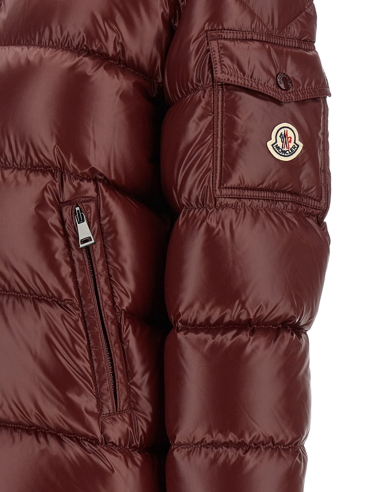 Indulge in the Moncler Bordeaux Polyamide Full-Length Jacket, a masterpiece of iconic boudin quilting and luxurious warmth, perfect for winter elegance and sophistication.
