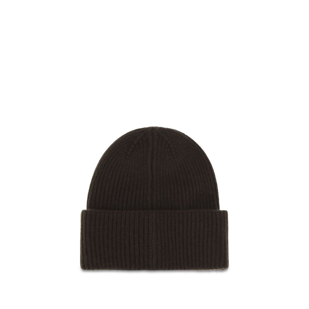 Discover the Max Mara Brown Cashmere Beanie, a timeless accessory crafted from pure cashmere, blending luxurious warmth with sophisticated elegance for every winter occasion.