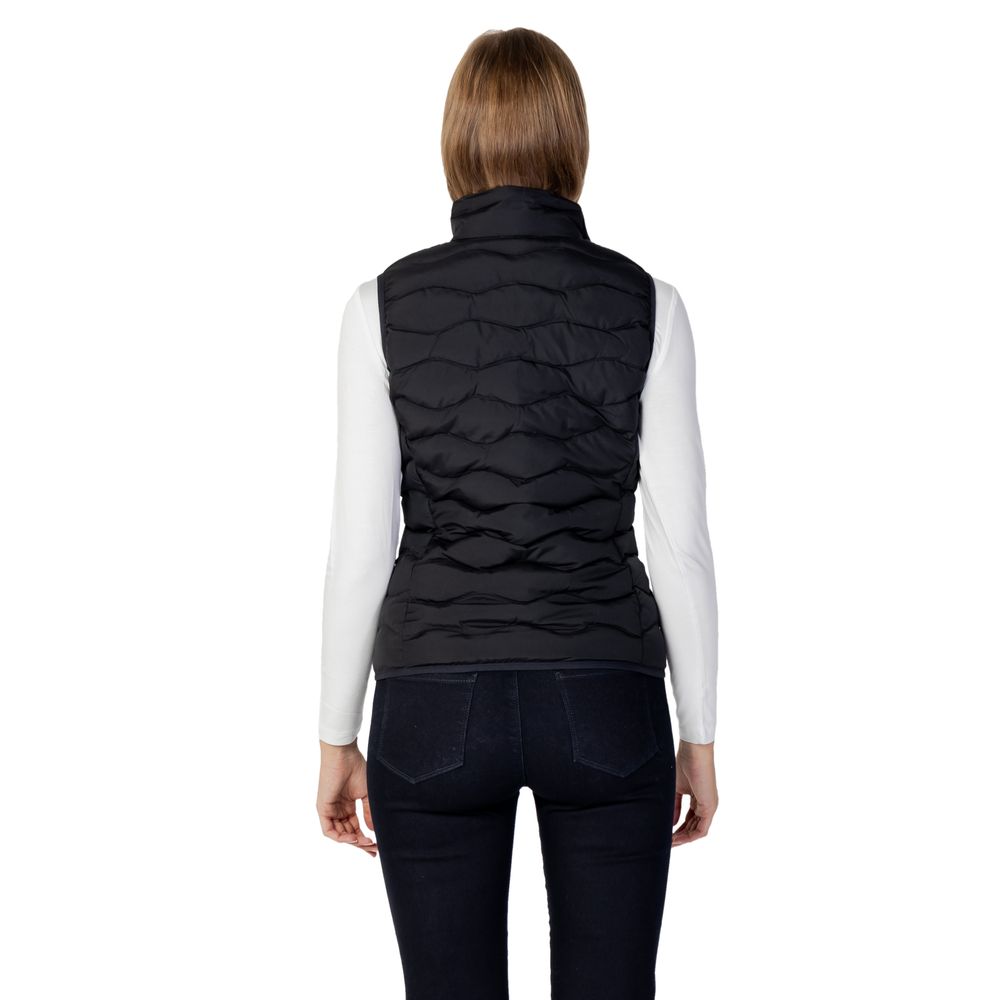 Discover the EA7 Emporio Armani Black Polyester Sleeveless Jacket, a luxurious layering essential crafted for effortless elegance and timeless versatility in every season.