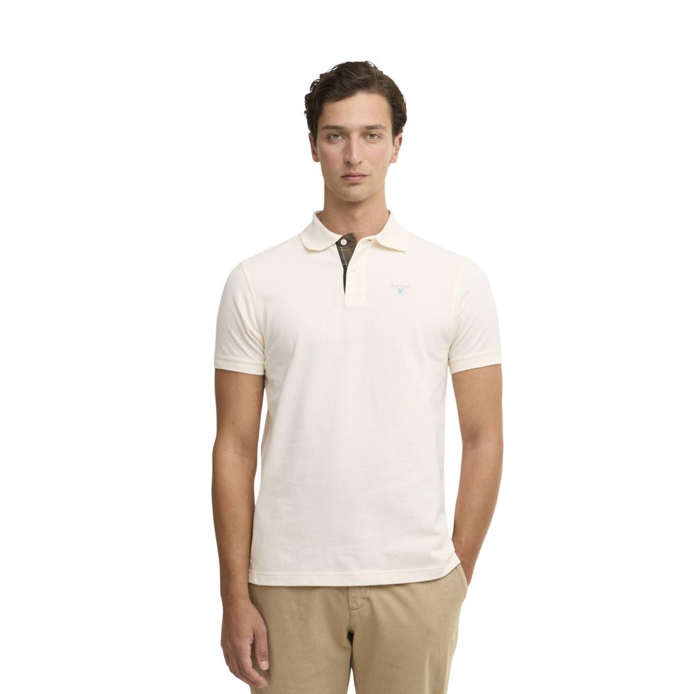 Elevate your wardrobe with the Barbour Cream Cotton Polo Shirt, a timeless piece crafted from luxurious cotton, embodying sophistication and effortless style for the modern individual.